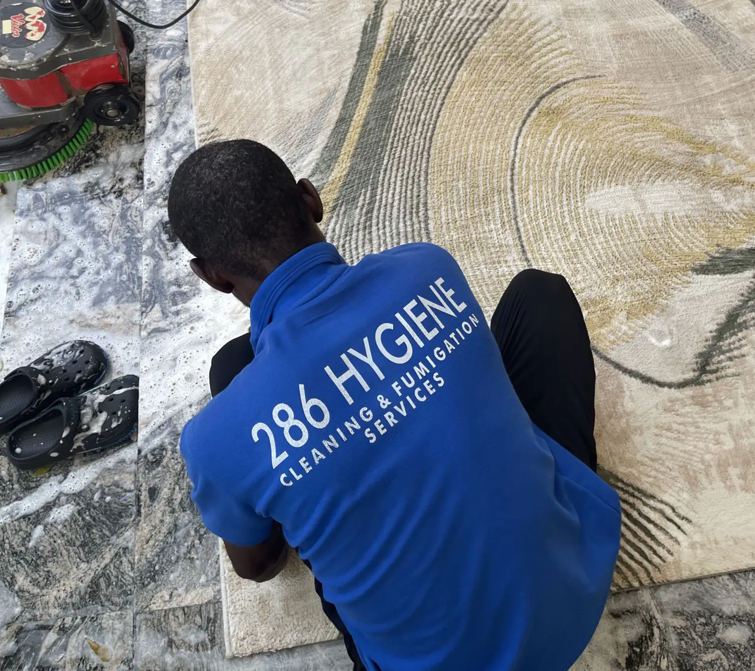 286 Hygiene team members holding cleaning supplies