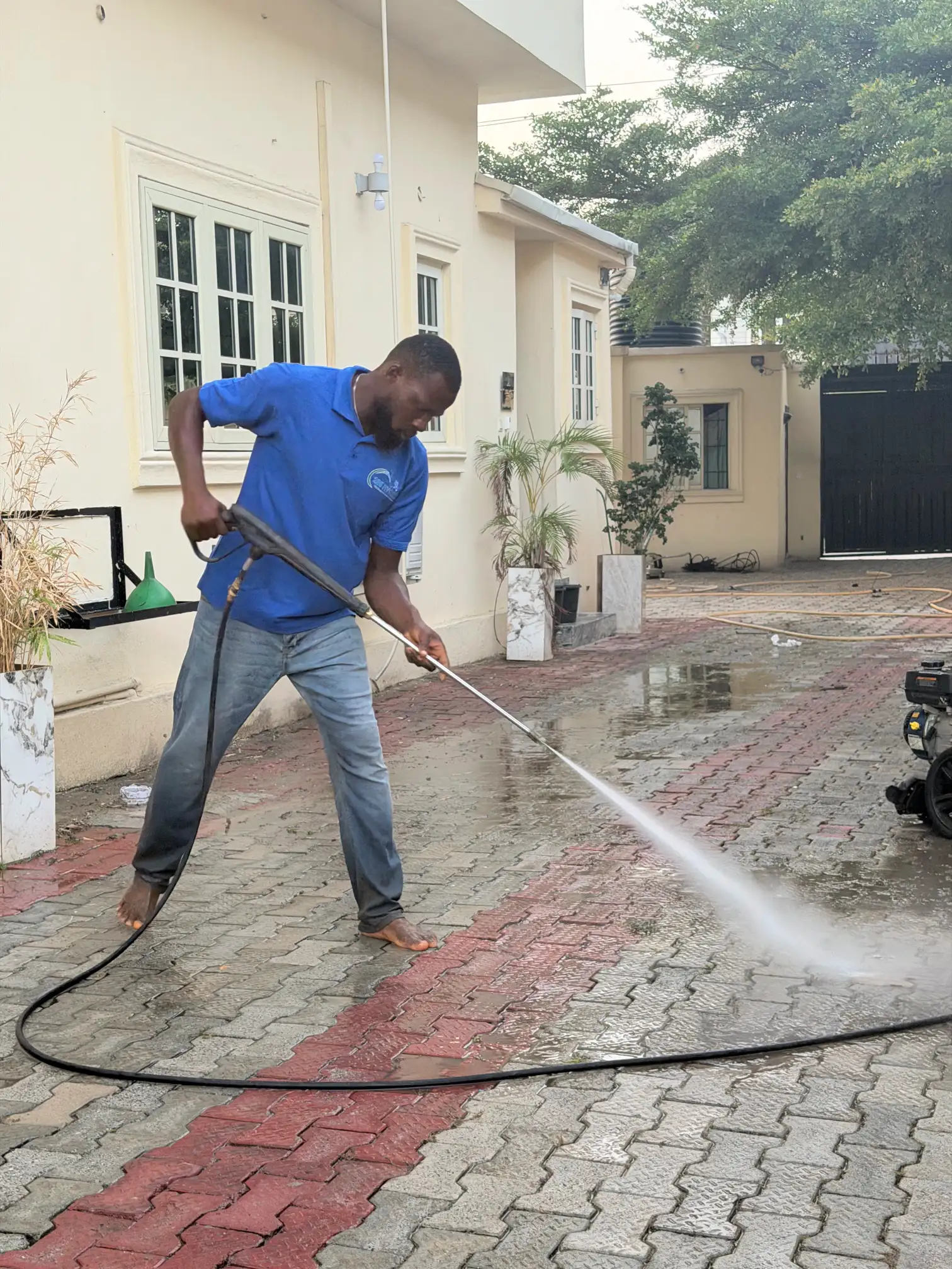 Pressure washing a driveway