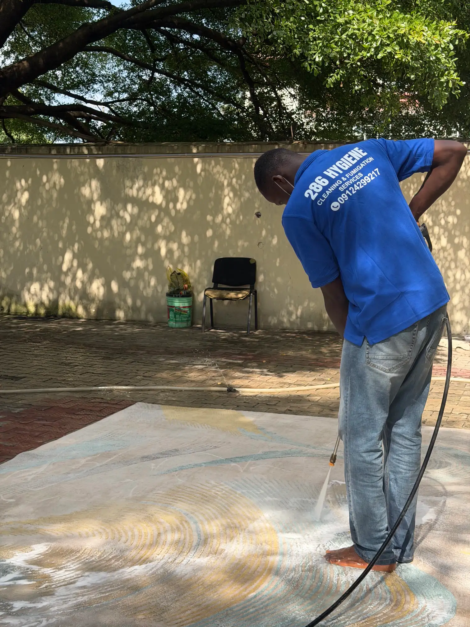 Pressure washing a walkway